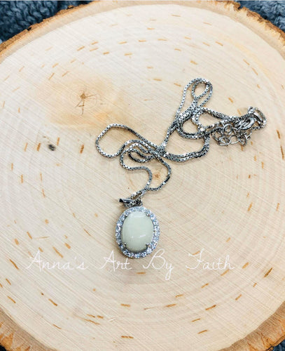 Oval halo necklace